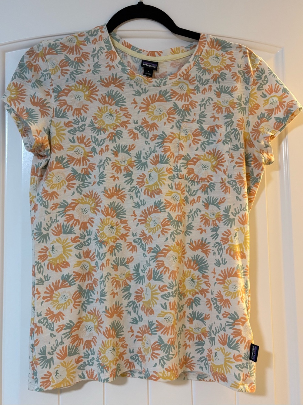 Patagonia Cream Floral Short Sleeve Tee with Orange & Yellow Accents